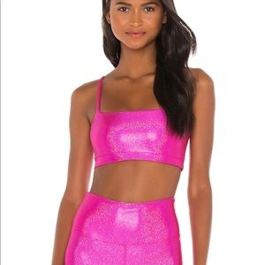 Beach riot pink holographic sports bra